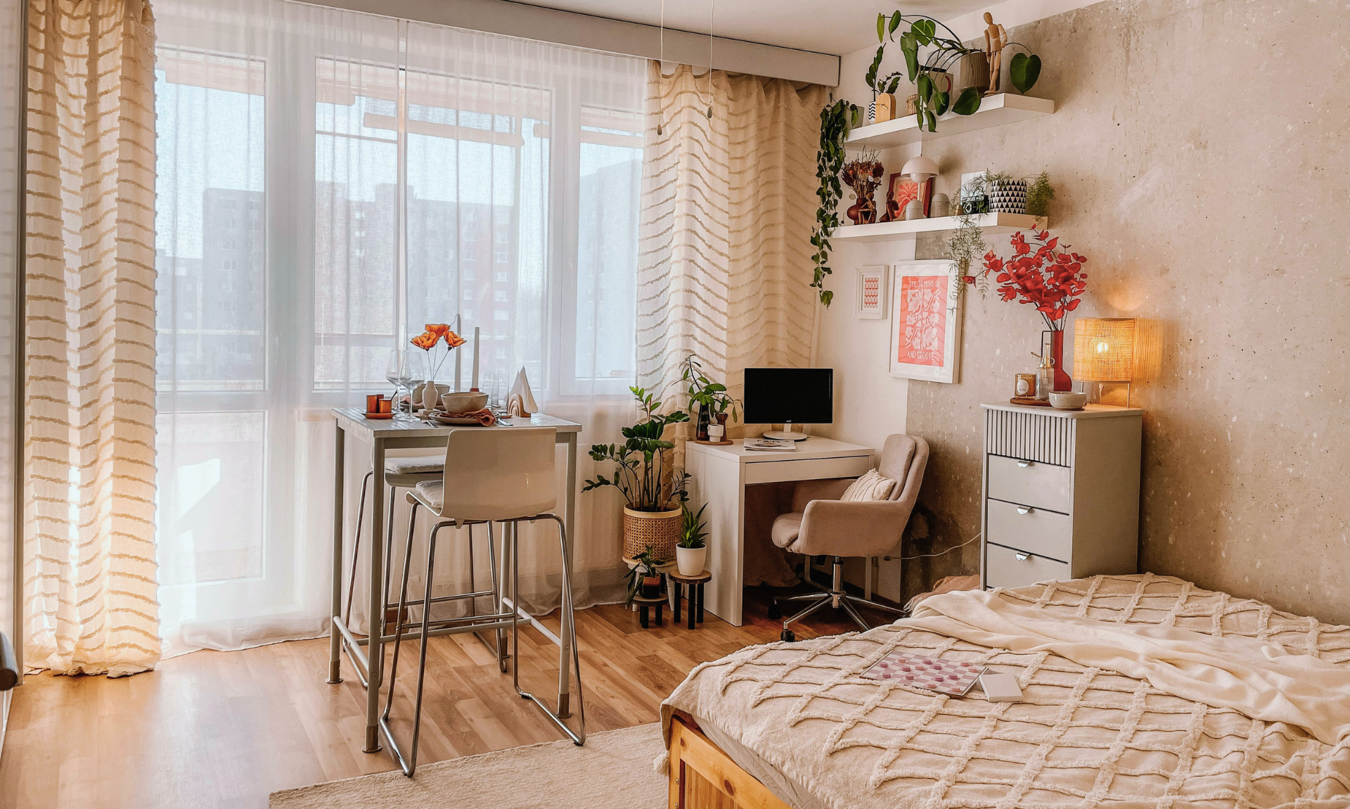 small living room and kitchen with warm tones and fun aesthetics