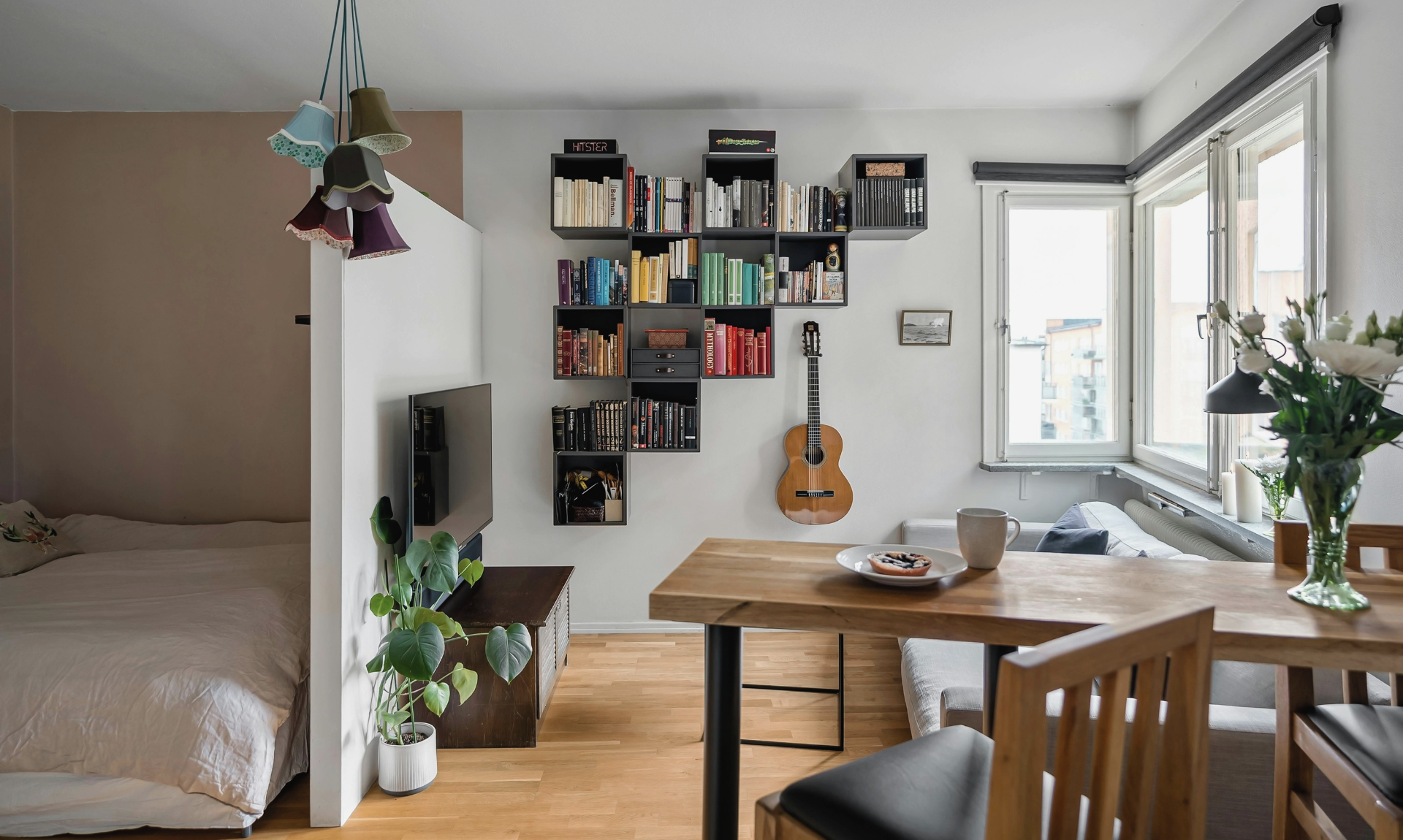 small apartment with bedroom and living room view